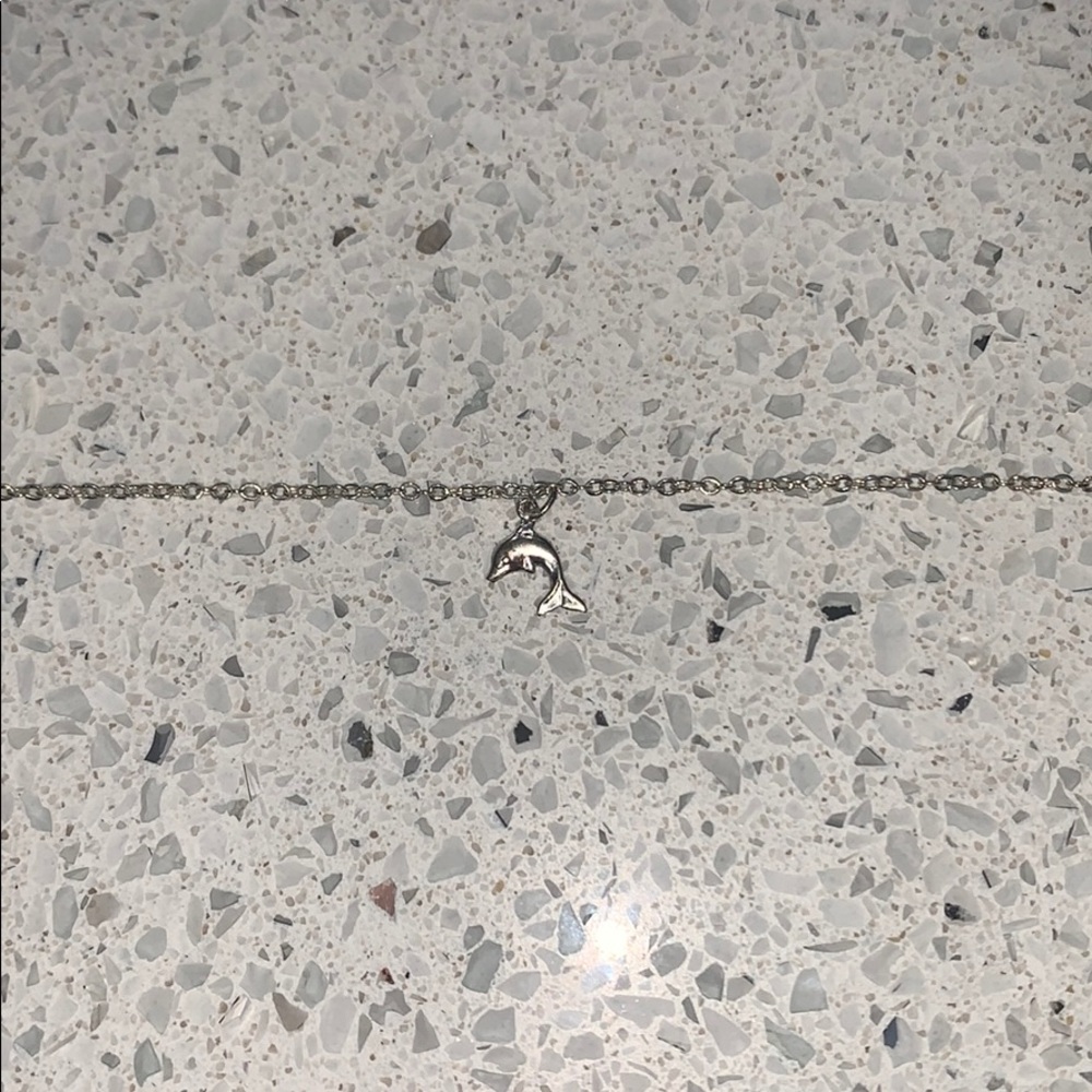 sliver dolphin charm braclet